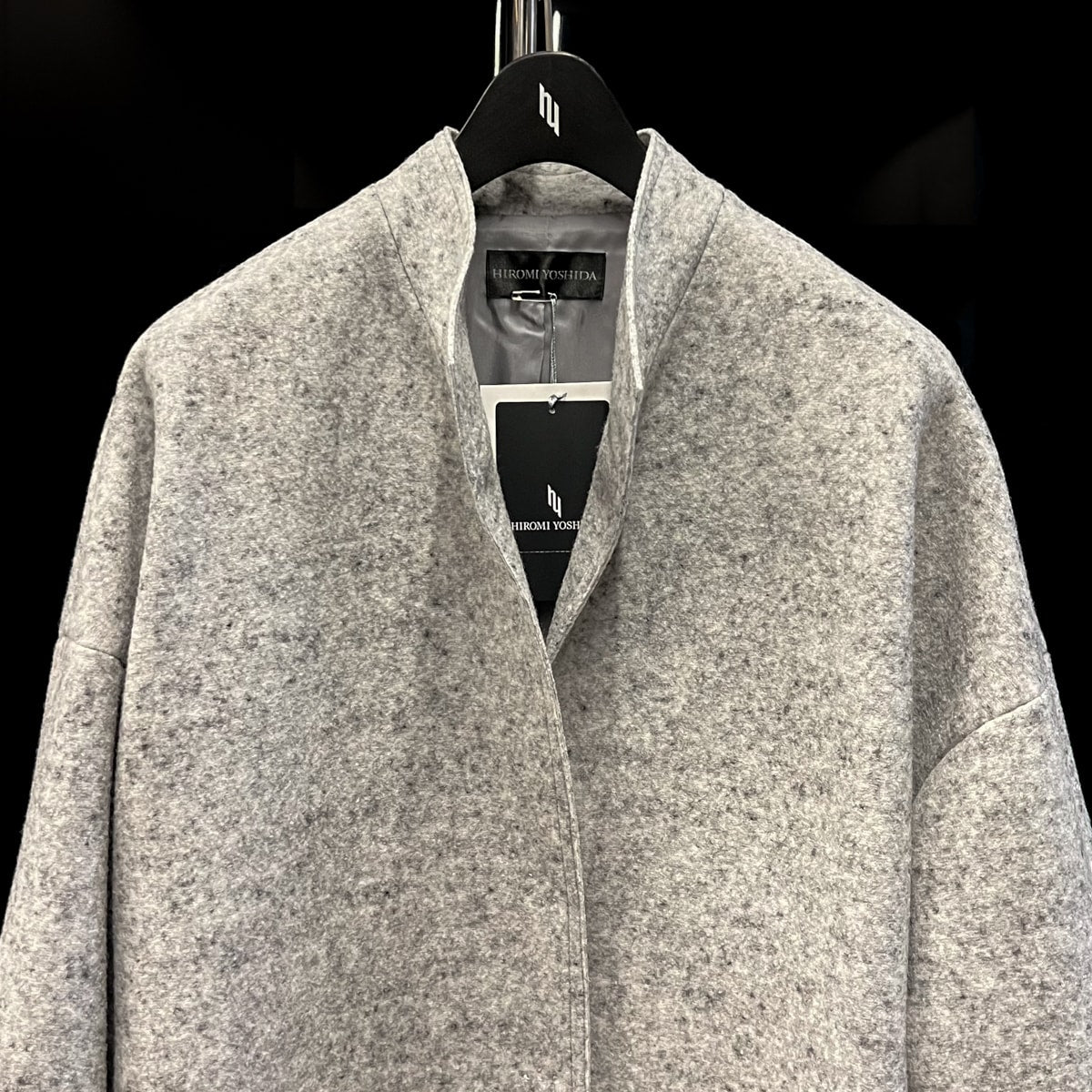 圧縮ジャージの裁ち切りコート